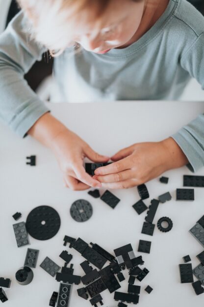 Child building LEGO