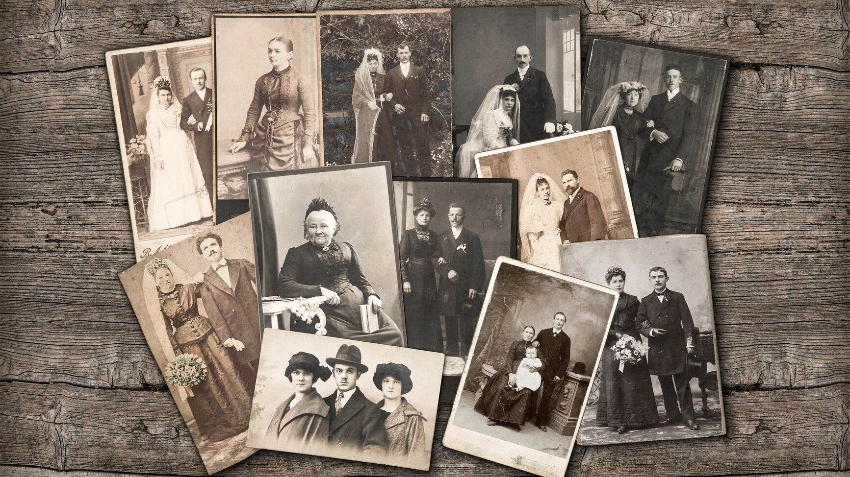 old black and white photos of people on a table top