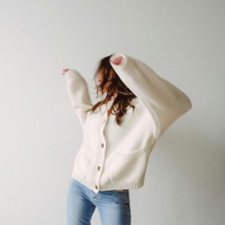 youth in sweater and jeans dances