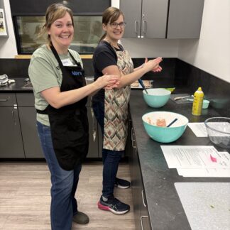 Two women cooking together